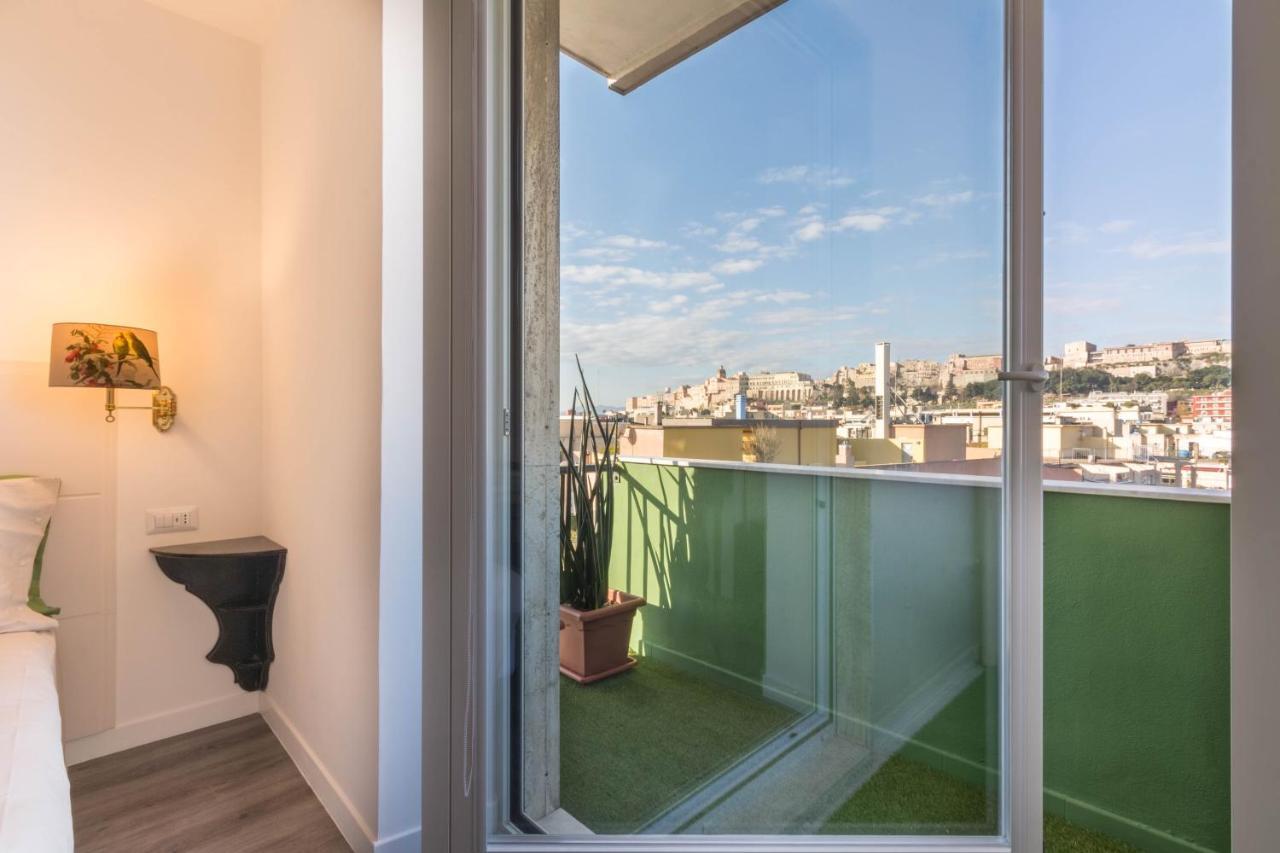 Eleventh Floor Suites Cagliari Bagian luar foto