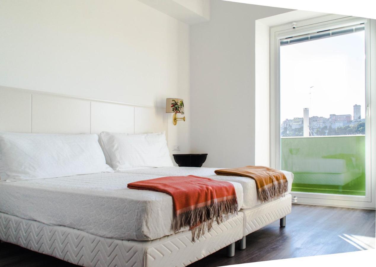 Eleventh Floor Suites Cagliari Bagian luar foto