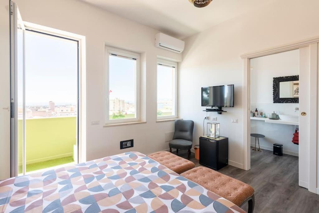 Eleventh Floor Suites Cagliari Bagian luar foto